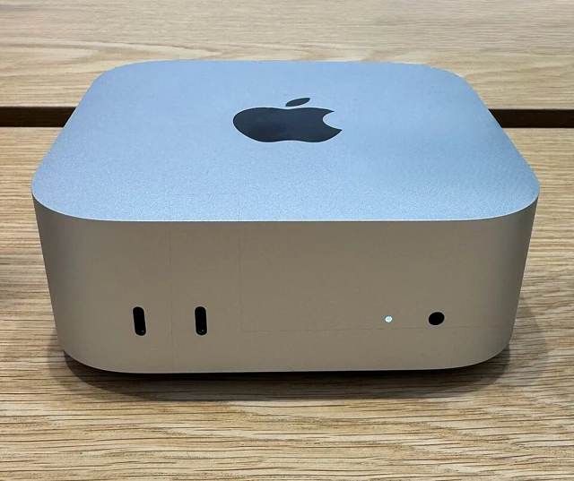 Front view of the compact silver Apple Mac mini M4