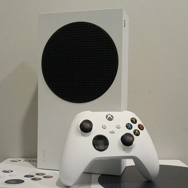 White Xbox Series S console with its white controller
